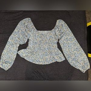 A floral blouse size medium from Shein
